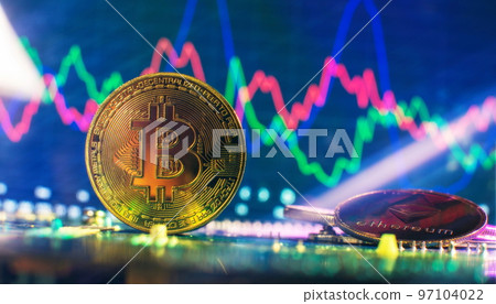 Cryptocurrency concept , Golden bitcoin on winners cup background mainboard , The future of money. Computational equipment. Cryptocurrency concept , Golden bitcoin on winners cup background mainboard , The future of money. Computational equipment. 97104022