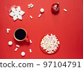 Christmas or winter composition. Cup with coffee, marshmallows and Christmas decor. Flat lay 97104791