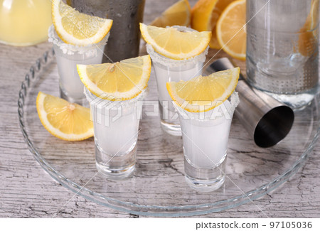 Shots vodka with lemon Shots vodka with lemon 97105036