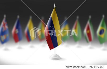 The national flag of the Venezuela on the background of flags of other countries The national flag of the Venezuela on the background of flags of other countries 97105366