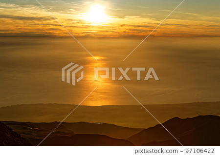 The sun setting over the Sea of Japan seen from Mt. Chokai 97106422