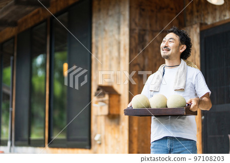 Image of a melon farmer 97108203