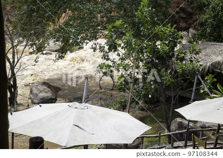 River flood are flowing down the mountain River flood are flowing down the mountain 97108344