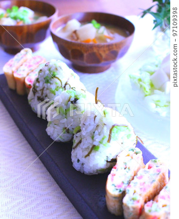 Mixed rice onigiri, tamagoyaki and miso soup Mixed rice onigiri, tamagoyaki and miso soup 97109398