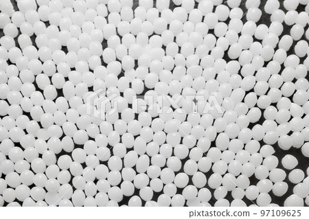 Close up picture of polyamide granules, selective focus. 97109625