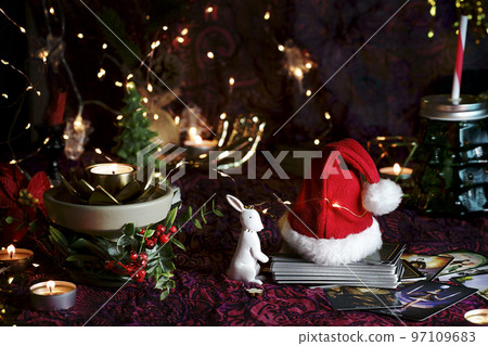 Tarot reader or Fortune teller reading on Christmas decoration. Tarot reader or Fortune teller reading on Christmas decoration. 97109683