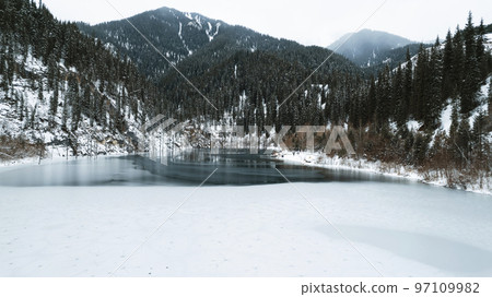 Unusual ice patterns on Kaindy Mountain Lake Unusual ice patterns on Kaindy Mountain Lake 97109982