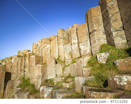 A few of the 40000 interlocking basalt columns at the Giant's Causeway by Bushmills in Northern Ireland, United Kingdom 97111202