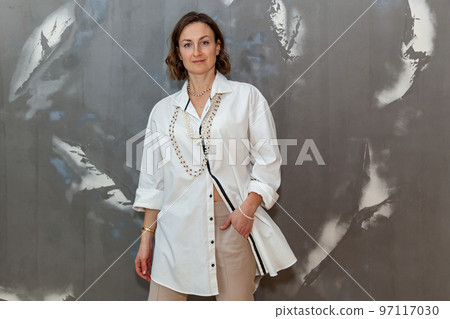 Girl posing in different clothes Girl posing in different clothes 97117030