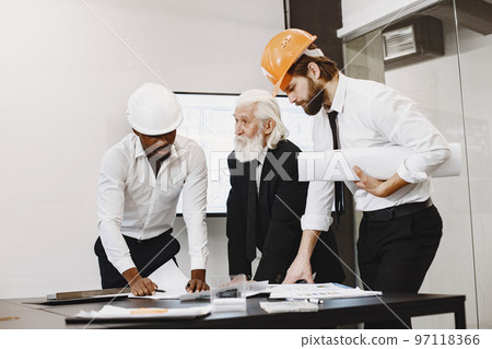 Team of business people in group. Architect and engineers. International partners. 97118366