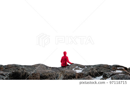 Mountaineer in red jacket sitting on the stone cliff and white background 97118715