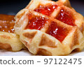 Close up fresh waffles with above strawberry jam 97122475