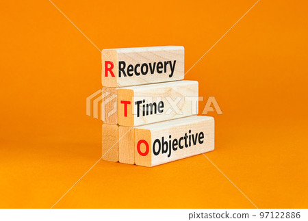 RTO recovery time objective symbol. Concept words RTO recovery time objective on wooden blocks on a beautiful orange background. Business and RTO recovery time objective concept. Copy space. 97122886