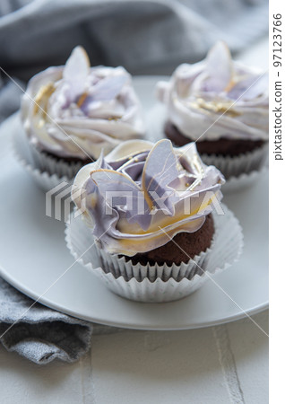 Cupcakes with butterfly decorations Cupcakes with butterfly decorations 97123766