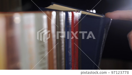 Many books organized in shelves in a big bookstore Many books organized in shelves in a big bookstore 97123778