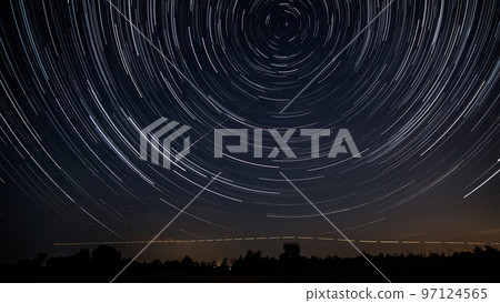 Star trails in the night sky Star trails in the night sky 97124565