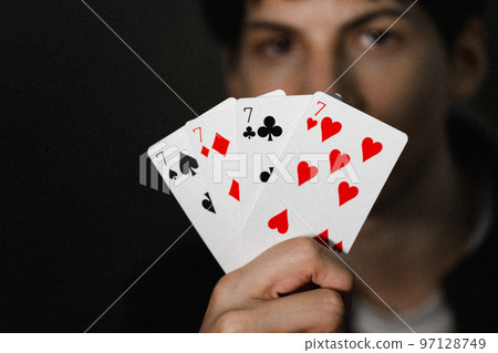 playing cards and man 97128749