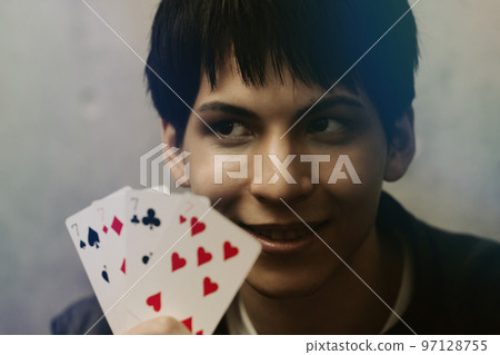 playing cards and man 97128755