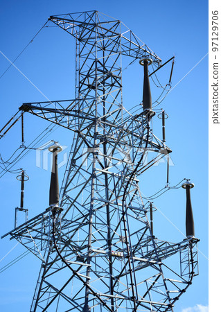 The low-angle view of a transmission tower 97129706
