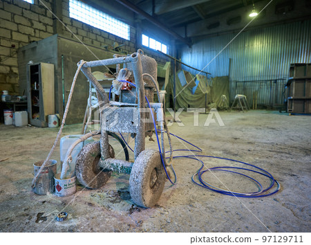 Old industrial paint sprayer all covered by many layers of old paint Old industrial paint sprayer all covered by many layers of old paint 97129711