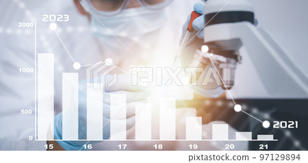 biochemical research scientist working with a microscope for the virus,Doctor touch arrow of the experimental results in a notebook, laboratory glassware containing chemical liquid for design. 97129894