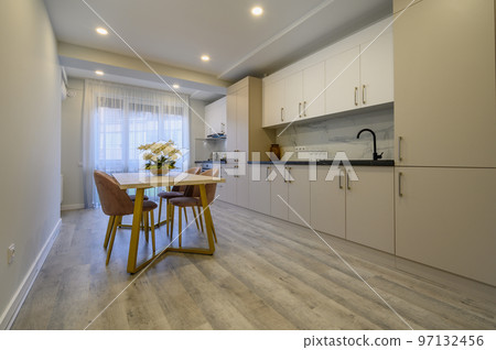 Large beige and cream luxury kitchen interior Large beige and cream luxury kitchen interior 97132456