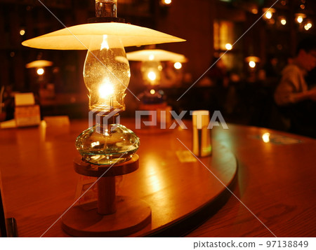 Romantic cafe with kerosene lamps 97138849