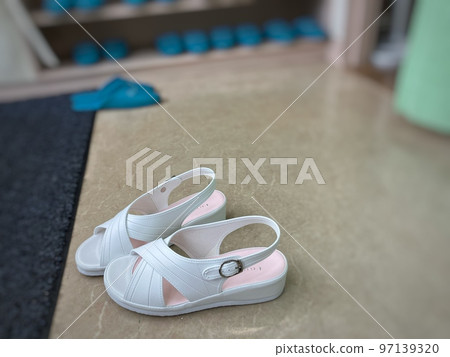 Nurse shoes placed at the reception 97139320