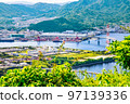 This is a distant view of the city in the eastern part of Hiroshima City. Kaita Ohashi Bridge, Yano Town, and part of Saka Town are visible. The front side is the purification center. 97139336