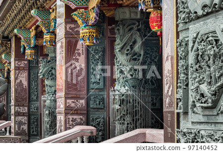 Sculptured dragons pillars and Red lantern of Taiwanese temple. Architecture view at Wat thamma katanyu or Tham Katanya Shrine Foundation (Sian Lor Tai Tian Gong). Sculptured dragons pillars and Red lantern of Taiwanese temple. Architecture view at Wat thamma katanyu or Tham Katanya Shrine Foundation (Sian Lor Tai Tian Gong). 97140452
