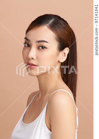 Beautiful young asian woman with clean fresh skin on beige background, Face care, Facial treatment, Cosmetology, beauty and spa, Asian women portrait. 97141841