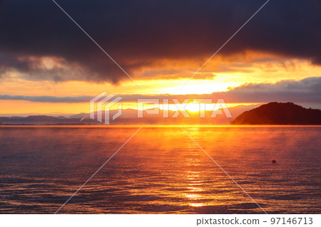 Sunrise over Lake Biwa in the morning mist and Chikubu Island Sunrise over Lake Biwa in the morning mist and Chikubu Island 97146713