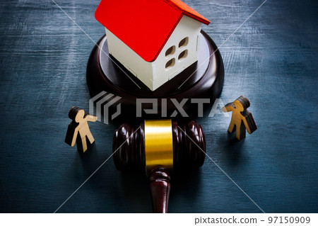 Figurines, a model of a house and a gavel, as a concept of inheritance law. Figurines, a model of a house and a gavel, as a concept of inheritance law. 97150909