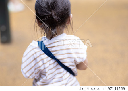 2 year old girl back view 97151569