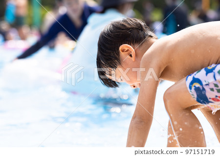 Infants playing in the pool 97151719