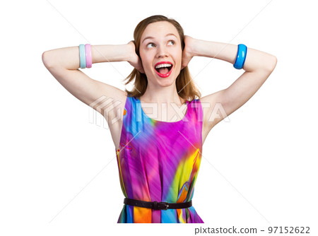 Redhead beautiful girl closing her ears with hands Redhead beautiful girl closing her ears with hands 97152622