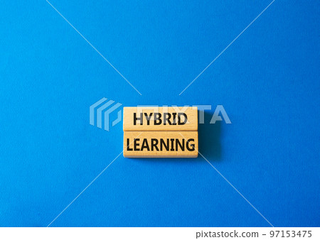 Hybrid learning symbol. Concept word Hybrid learning on wooden blocks. Beautiful blue background. Business and Hybrid learning concept. Copy space Hybrid learning symbol. Concept word Hybrid learning on wooden blocks. Beautiful blue background. Business and Hybrid learning concept. Copy space 97153475