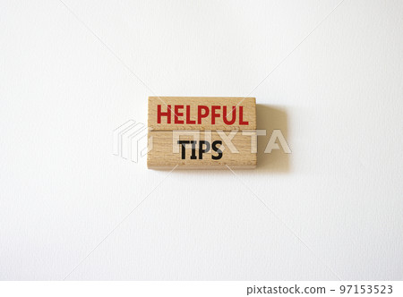 Helpful tips symbol. Wooden blocks with words Helpful tips. Beautiful white background. Business and Helpful tips concept. Copy space. Helpful tips symbol. Wooden blocks with words Helpful tips. Beautiful white background. Business and Helpful tips concept. Copy space. 97153523