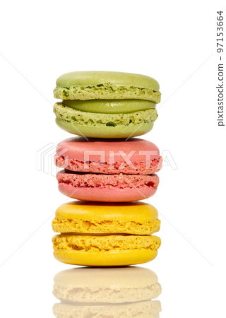 Macaron. Traditional french colorful macarons close up, macro isolated on white Macaron. Traditional french colorful macarons close up, macro isolated on white 97153664