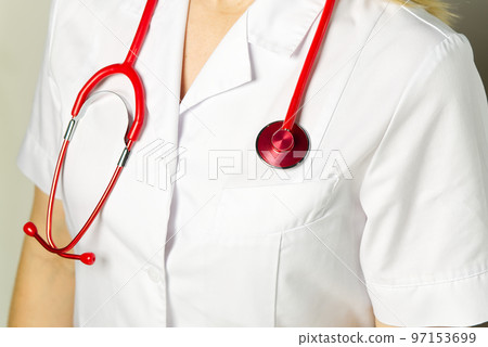 bright close up of doctor with red stethoscope. Medical background 97153699