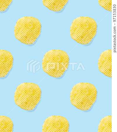 Seamless pattern made from Potato chips on light blue background flat lay. potato snack chips isolated Fast food banner. 97153830