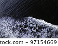 Rough waves seen from the deck of the ship in the evening 97154669