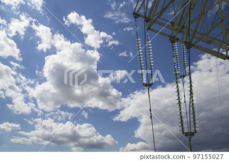 Electricity pylon (high voltage power line) on the background of the cloudy sky 97155027
