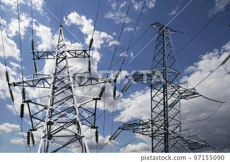 Electricity pylon (high voltage power line) on the background of the cloudy sky 97155090