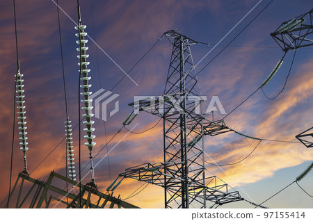 Electricity pylon (high voltage power line) against the background of a romantic evening sky 97155414