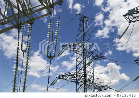 Electricity pylon (high voltage power line) on the background of the cloudy sky 97155418