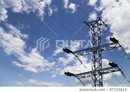 Electricity pylon (high voltage power line) on the background of the cloudy sky 97155610