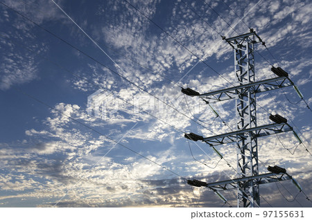 Electricity pylon (high voltage power line) on the background of the cloudy sky 97155631