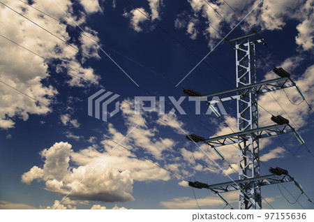 Electricity pylon (high voltage power line) against the background of a romantic evening sky Electricity pylon (high voltage power line) against the background of a romantic evening sky 97155636