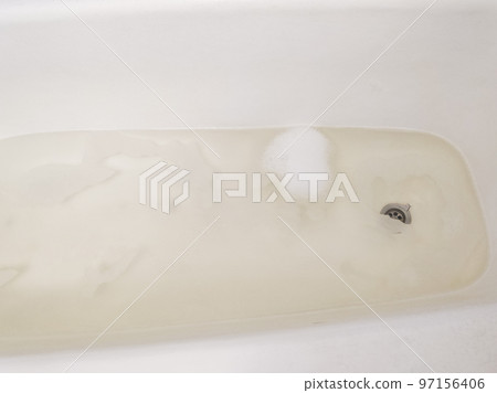 white bath with yellow dirty water transparent 97156406